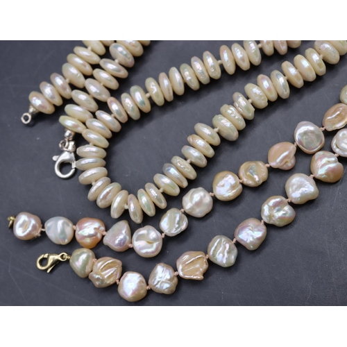 507 - A Mother of Pearl bead necklace with 9ct gold clasp and a similar necklace (2)