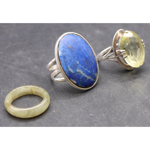 515 - A silver large oval lapis lazuli ring, size O/P, a silver ring set with pale green stone, size O and... 