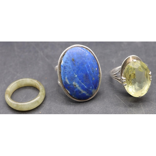 515 - A silver large oval lapis lazuli ring, size O/P, a silver ring set with pale green stone, size O and... 