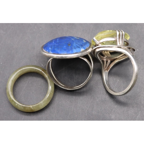 515 - A silver large oval lapis lazuli ring, size O/P, a silver ring set with pale green stone, size O and... 