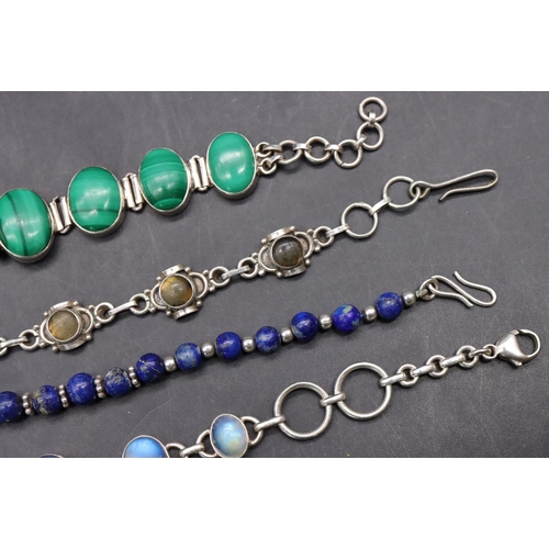 517 - A silver and malachite bracelet and 3 various silver bracelets (4)