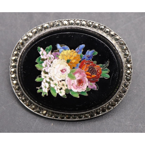 523 - A silver oval micro mosaic brooch with multi-coloured floral centre and cut steel rim, 3.2cm wide