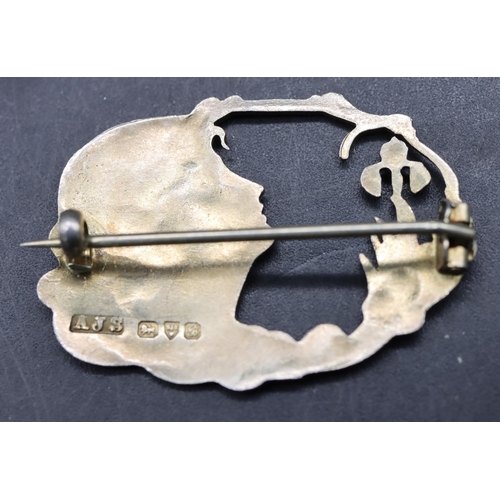 524 - An Edward VII silver Art Nouveau style brooch in the form of a figurehead of a lady, maker's mark AJ... 