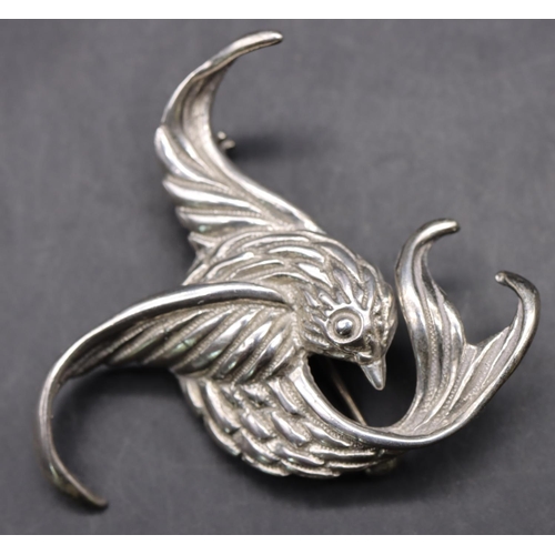 526 - A 925 silver brooch in the form of a bird, 5cm wide, 14.4 grams