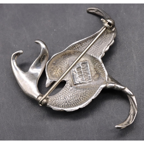 526 - A 925 silver brooch in the form of a bird, 5cm wide, 14.4 grams