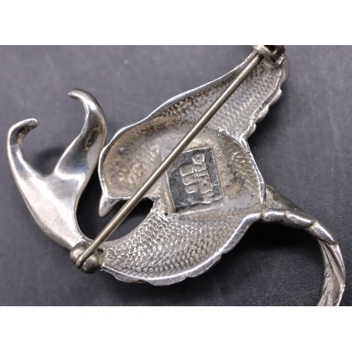 526 - A 925 silver brooch in the form of a bird, 5cm wide, 14.4 grams