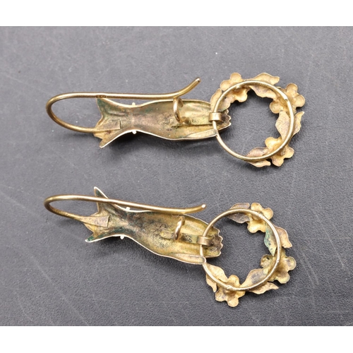 533 - A pair of 9ct gold novelty drop earrings in the form of hands holding garland mounted with turquoise... 