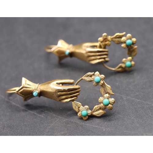 533 - A pair of 9ct gold novelty drop earrings in the form of hands holding garland mounted with turquoise... 