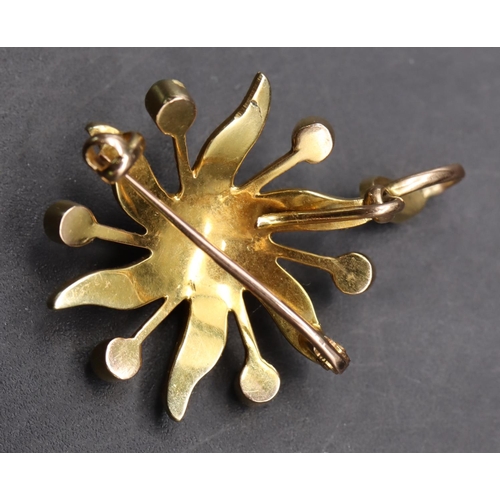 540 - A 9ct gold pendant/brooch in the form of a star mounted with half pearls and turquoise, 3.5cm high, ... 