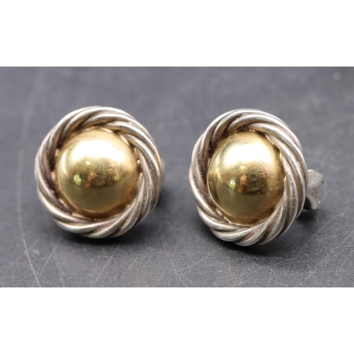 543 - A pair of 18ct gold and silver mounted circular earrings, 11.2 grams gross