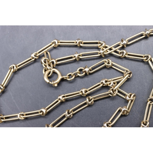 547 - A 9ct gold rectangular linked chain, 79cm long, 23 grams