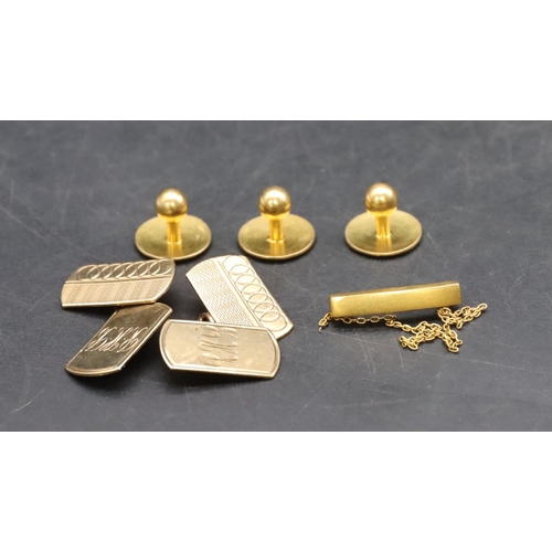 558 - A pair of 9ct gold gentleman's cufflinks, 3.1 grams, 3 18ct gold dress studs, 6.3 grams and a small ... 