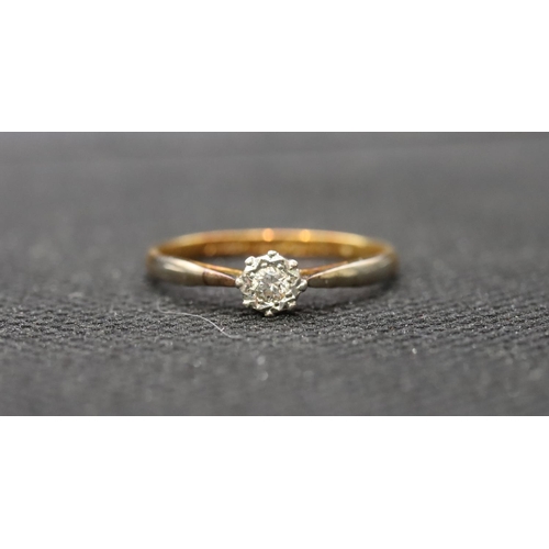 565 - An 18ct gold and platinum ladies' solitaire diamond ring, size N/O, 2 grams