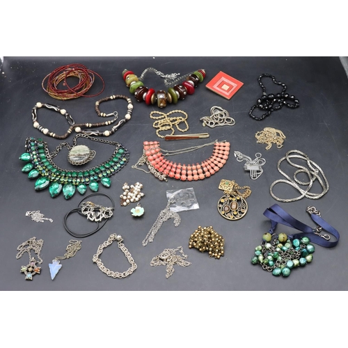 577 - A quantity of various costume and other jewellery including bead necklaces etc.