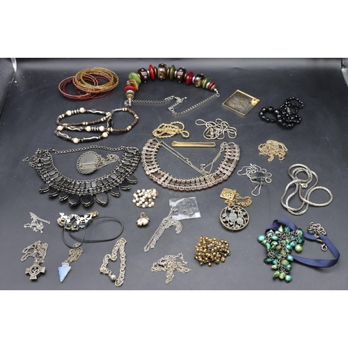 577 - A quantity of various costume and other jewellery including bead necklaces etc.