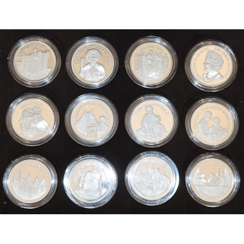 584 - A cased set of 12 silver coins HM Queen Elizabeth the Queen Mother, Birmingham Mint, cased.