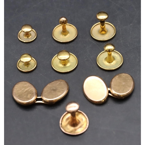 586 - A pair of 15ct gold gentleman's plain oval cufflinks, 5.7 grams and 7 various 9ct gold dress studs, ... 