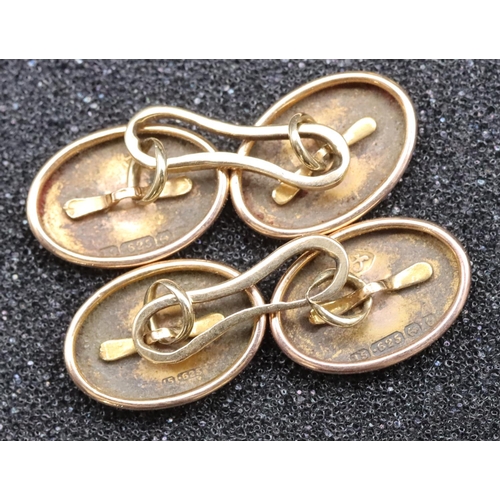 586 - A pair of 15ct gold gentleman's plain oval cufflinks, 5.7 grams and 7 various 9ct gold dress studs, ... 