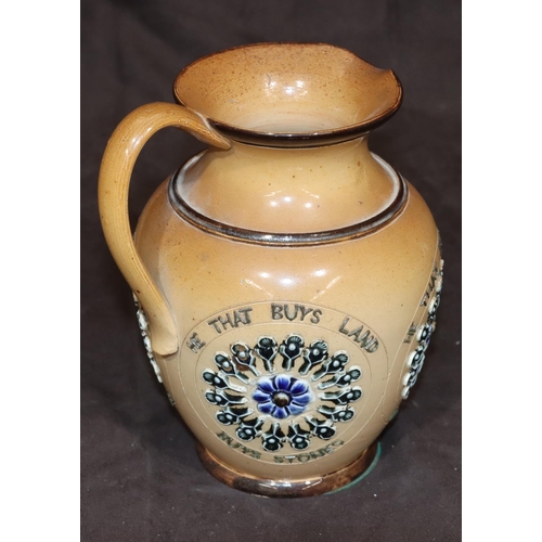 6 - A Royal Doulton glazed stoneware round bulbous shaped jug with raised 