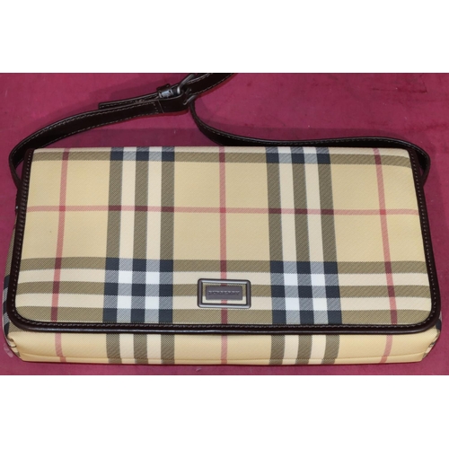 645 - A Burberry classic clutch bag, 29cm wide, with outer cover (bag in good condition)