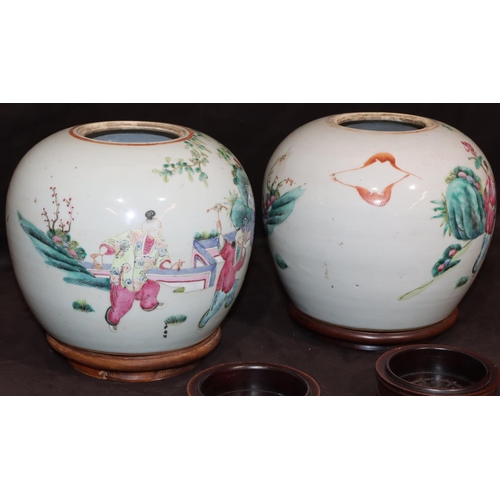 67 - A pair of 19th Century Chinese round bulbous shaped ginger jars with wooden covers and stands on whi... 