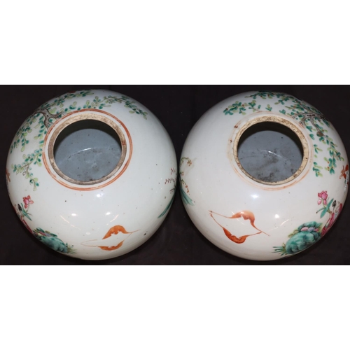 67 - A pair of 19th Century Chinese round bulbous shaped ginger jars with wooden covers and stands on whi... 