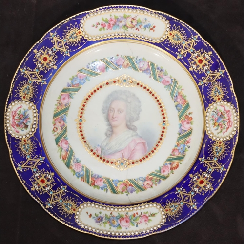 71 - An 18th/19th Century Sevres plate on white and blue ground with shoulder length portrait of a lady t... 