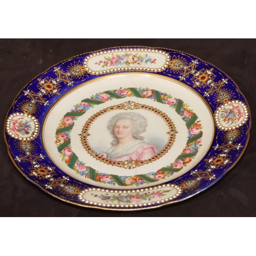 71 - An 18th/19th Century Sevres plate on white and blue ground with shoulder length portrait of a lady t... 