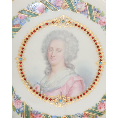 71 - An 18th/19th Century Sevres plate on white and blue ground with shoulder length portrait of a lady t... 