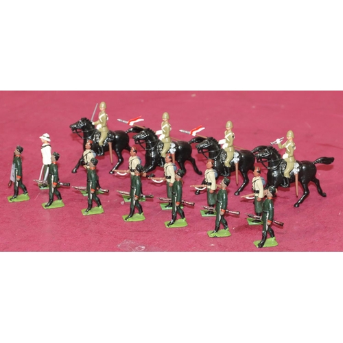 710 - 5 W Britain painted lead figures of Gurkhas, 4 W Britain figures on horseback and 8 similar figures ... 