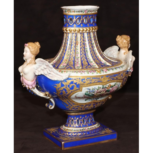 73 - A Sevres large oval bulbous thin necked vase with 2 raised winged angels on white and blue ground wi... 