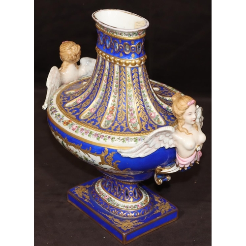 73 - A Sevres large oval bulbous thin necked vase with 2 raised winged angels on white and blue ground wi... 