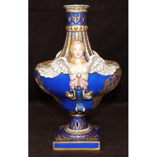 73 - A Sevres large oval bulbous thin necked vase with 2 raised winged angels on white and blue ground wi... 