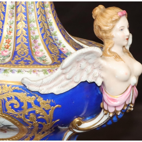 73 - A Sevres large oval bulbous thin necked vase with 2 raised winged angels on white and blue ground wi... 