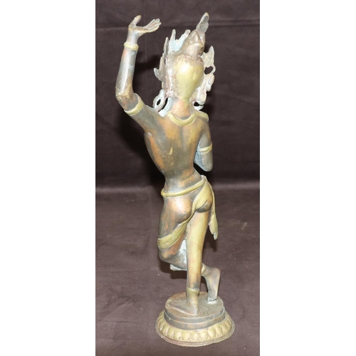 731 - A bronze and gilt figure of an Eastern dancer on round base, 42cm high