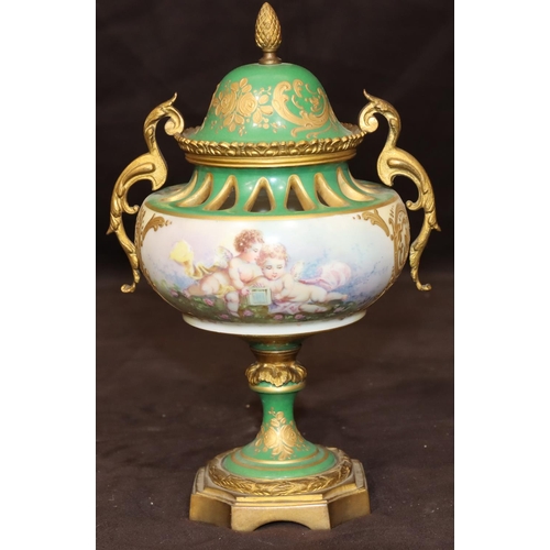 74 - A Sevres porcelain and ormolu round bulbous thin necked lidded potpourri on white and green ground w... 