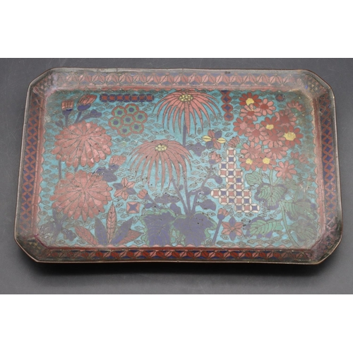 740 - An Oriental cloisonné rectangular shaped dish with multi-coloured floral and leaf decoration, 25cm w... 