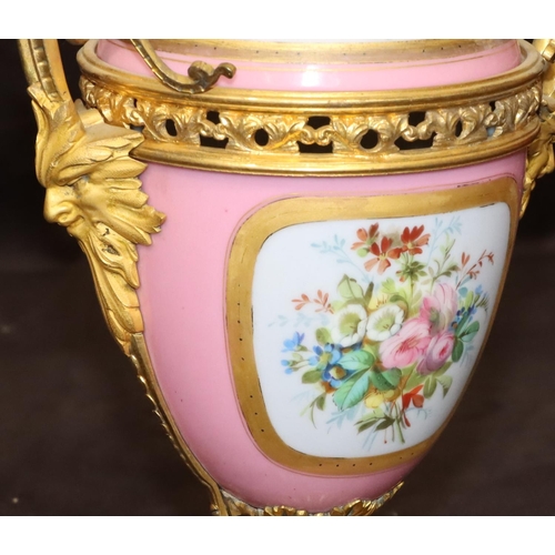 75 - A 19th Century Sevres style porcelain and ormolu lidded vase on pink ground with multi-coloured cupi... 