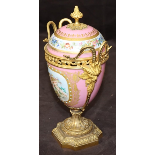 75 - A 19th Century Sevres style porcelain and ormolu lidded vase on pink ground with multi-coloured cupi... 