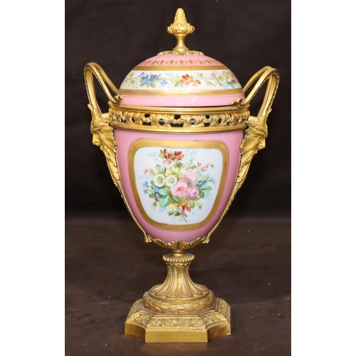 75 - A 19th Century Sevres style porcelain and ormolu lidded vase on pink ground with multi-coloured cupi... 