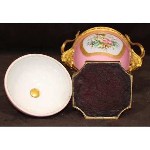 75 - A 19th Century Sevres style porcelain and ormolu lidded vase on pink ground with multi-coloured cupi... 