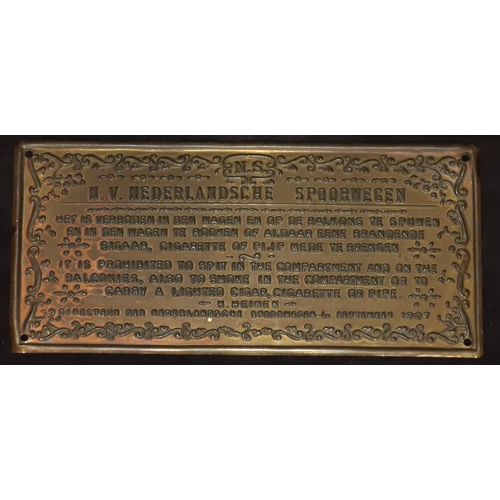 770 - A cast iron railway sign, 29cm wide and a small brass Continental sign, 16.5cm wide (2)