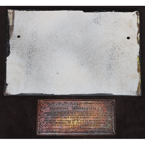 770 - A cast iron railway sign, 29cm wide and a small brass Continental sign, 16.5cm wide (2)