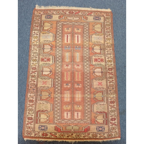 771 - A Persian style rug with multi-coloured decoration, centre medallion, 140cm x 88cm