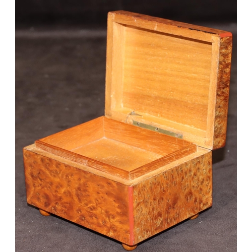 772 - A Maplewood rectangular shaped musical box with 2 airs and hinged lid, 12.5cm wide