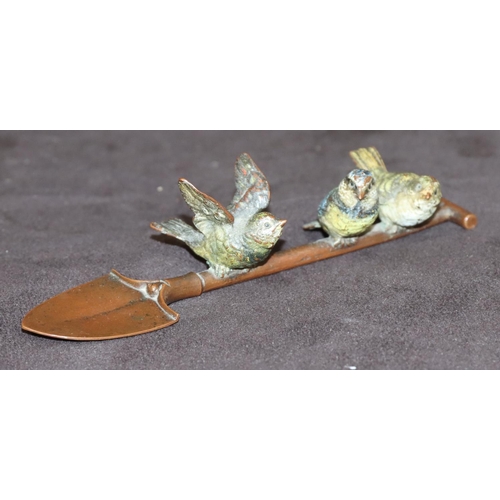 775 - A Viennese cold painted bronze group of 3 birds perched on a shovel, 14cm long