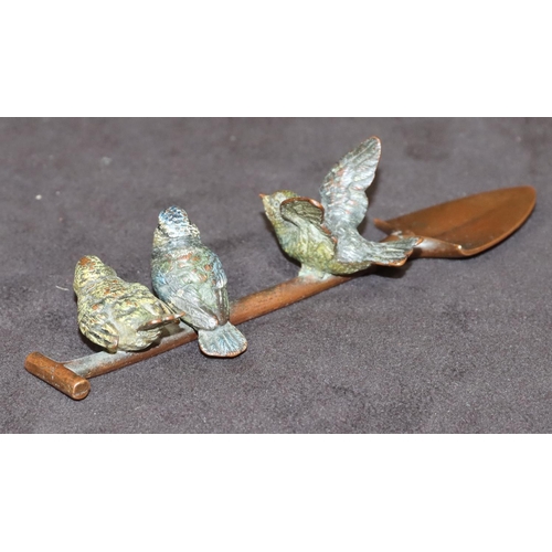 775 - A Viennese cold painted bronze group of 3 birds perched on a shovel, 14cm long