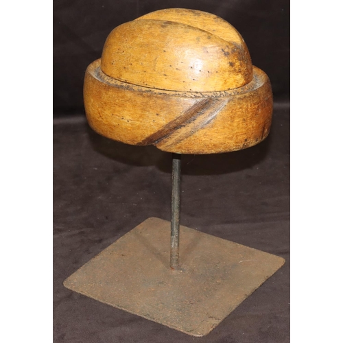 778 - A wooden and iron tabletop hat maker's mould, 32cm high