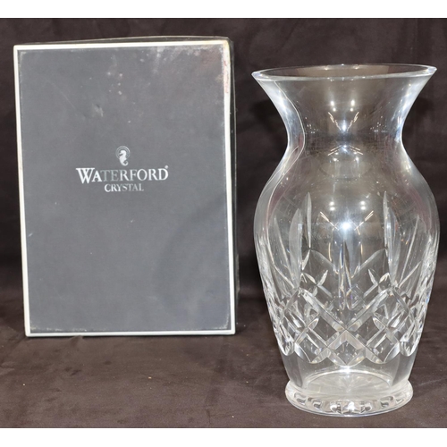 79 - A Waterford cut glass round bulbous thin necked trumpet shaped vase, 25.5cm high (Boxed)