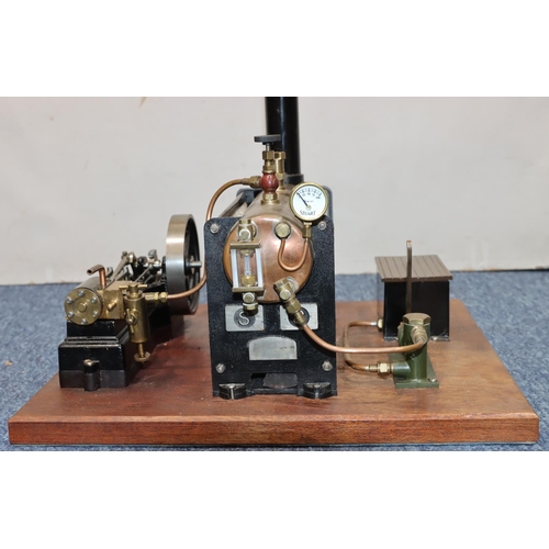 790 - A Stuart stationary live model steam engine mounted on mahogany base, 37cm x 34cm